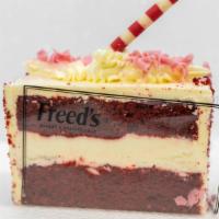 Red Velvet Cake Slice · Freed's traditional red velvet cake filled with our signature cream cheese icing and iced wi...