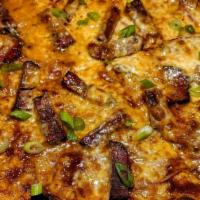 Bbq Brisket Pizza  · Slow smoked beef brisket, poblano pepper buffalo milk mozzarella, red onion, scallions, Caro...