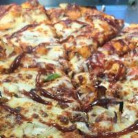 Bbq Chicken Pizza · With bacon and Onion.
