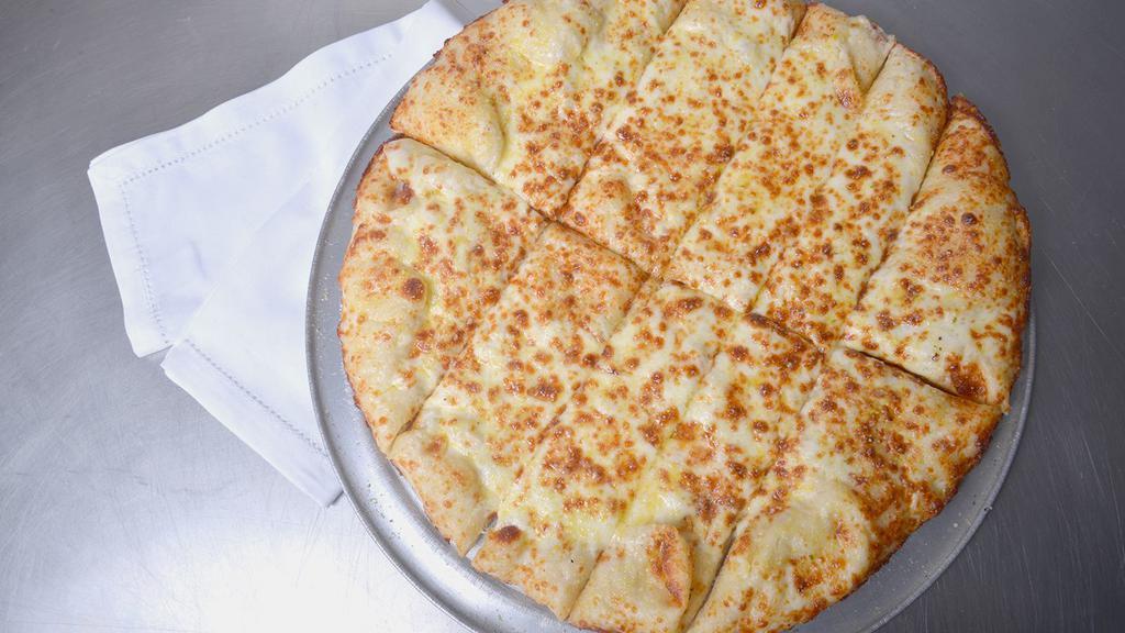 Cheese Bread · Fresh baked topped with mozzarella cheese, garlic butter Parmesan, and garlic bread seasoning.