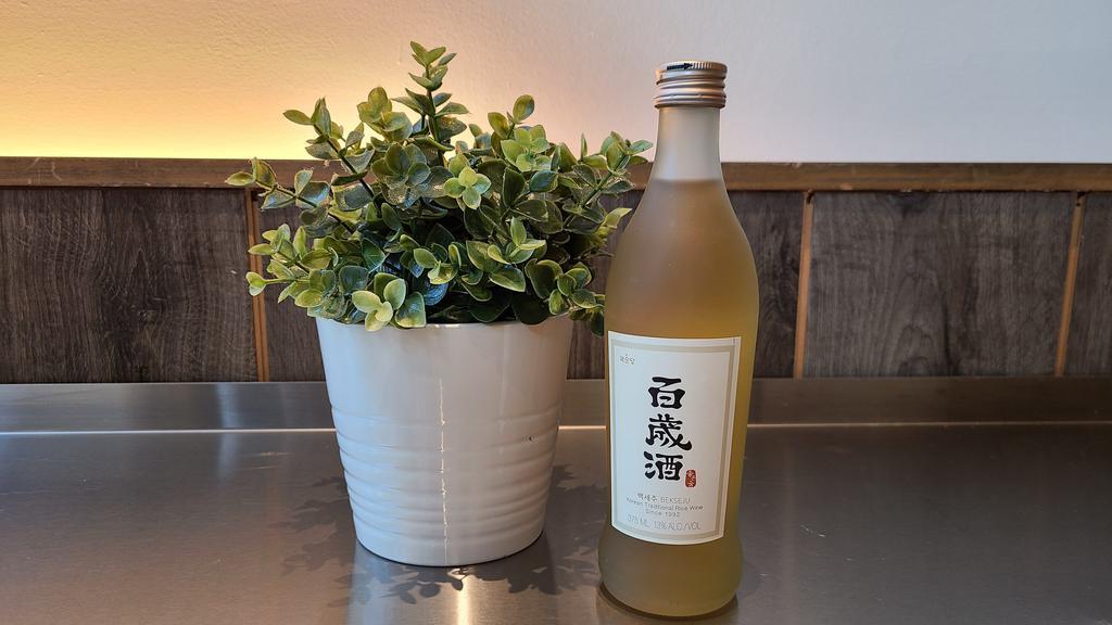 Bekseju | 375Ml · Baekseju is a Korean glutinous rice-based fermented alcoholic beverage flavored with a variety of herbs, ginseng most prominent among them. The name comes from the legend that the healthful herbs in baekseju will result an individual to live up to 100 years old.