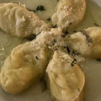 Culurgiones · Sardinian ravioli stuffed with a potato filling flavored with fresh mint leaves, Pecorino ch...