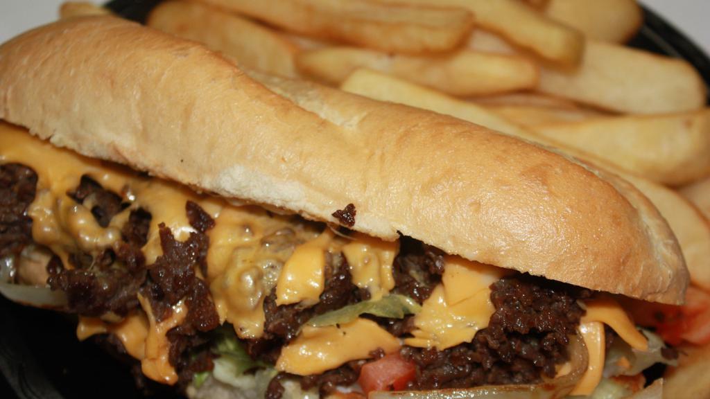 Cheese Steak Sub W/ French Fries · Cheese Steak Sub w/American Cheese, Lettuce, Tomato, Mayo, Fried onion and French Fries