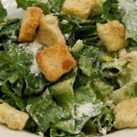 Side Caesar · Hearts of romaine with Caesar dressing, parmesan cheese and garlic croutons