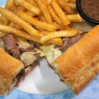 French Dip · Our lean Angus Sirloin roast beef, thin sliced, served on French bread with au jus and homem...