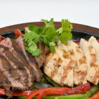 Fajita Combo · Our classic steak and chicken fajitas served on a sizzling hot skillet with grilled onions a...