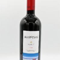 Bt-Dionysos Merlot · Peloponnese, Greece - Bright ruby color with purple hues. It has a fresh complex aromatic no...