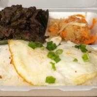 Tapsilog Plate · Marinated beef with garlic, soy, vinegar.  includes 2 scoop of rice, 2 eggs and atchara.