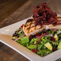 Grilled Salmon Salad · grilled salmon, cranberries, avocado, cucumber, red onion, crispy carrots, mixed greens, aru...