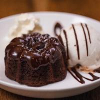 Ultimate Chocolate Lava Cake · warm chocolate cake filled with melted chocolate ganache and served with edy’s vanilla bean ...