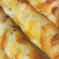 Garlic Bread With Cheese · 4 pieces of French bread brushed with garlic butter, loaded with mozzarella, oven-toasted an...