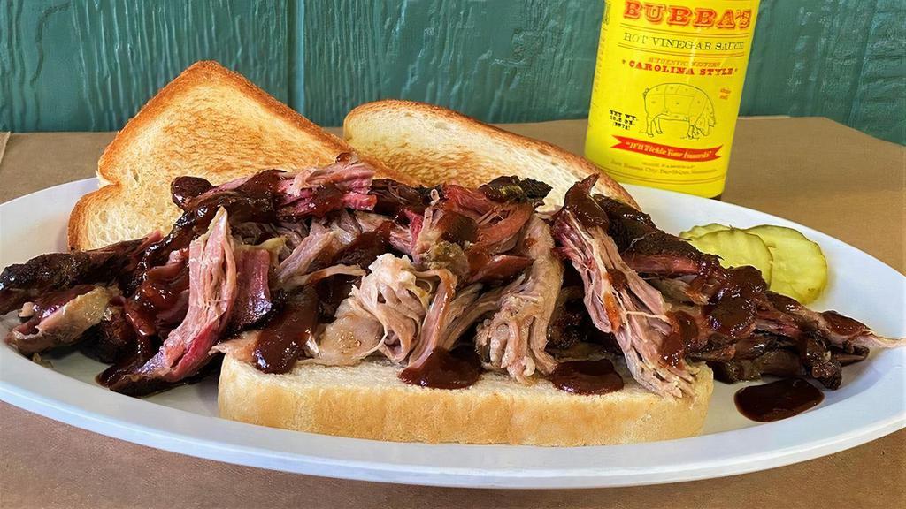One Meat Dinner · Your choice of pulled pork, brisket, turkey, ham, sausage. Served with one side dish and Texas toast.