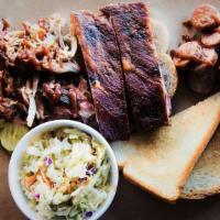 The Hogamaniac · Two ribs, pulled pork, and sausage. Served with one side and Texas Toast.