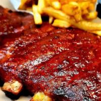 Slab Dinner · One full slab of ribs. Served with one side dish and Texas toast.