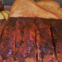 Rib Dinner · Half slab of ribs. Served with one side dish and Texas toast.