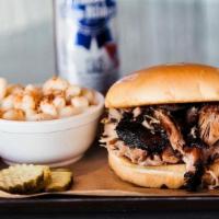 Pulled Pork · Pulled pork available hot and ready to serve or fully smoked then chilled to serve at a late...