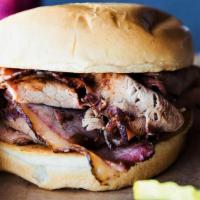 Beef Brisket · Sliced beef brisket available hot and ready to serve or fully smoked then chilled to serve a...