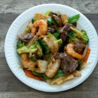 Triple Delight · Shrimp chicken, beef sauteed with mixed vegetables