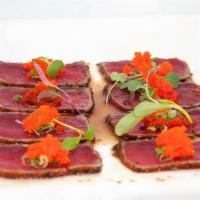 Tuna Tataki · Sliced sealed tuna & served w. Ponzu sauce.