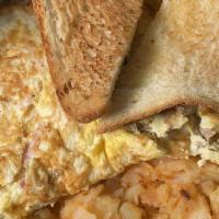 2 Eggs Platter · 2 farm fresh eggs any style, home-fries and buttered toast.
