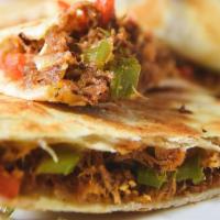Quesadilla · Mexican blended cheese, sautéed bell peppers and onions, housemade salsa. Add chicken, short...