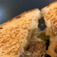 The Meltdown · Texas toast, beef patties, cheese, bell pepper, onions, mushrooms, cheese sauce