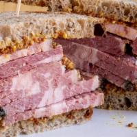 Pastrami Sandwich · 8oz of house smoked pastrami on rye with Seattle Mustard Co. Grain Mustard. Served with a si...