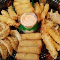 Happy Quickway Fried Plate · 20 pic Spring rolls;
16 pic chicken dumplings;
9 pic shrimp tempuras;
2 pic yammy sauce
