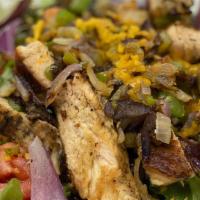 Jerk Chicken Salad · Jerk chicken, spring mix, cheddar cheese, red onions, tomato, boiled egg, carrots, bell pepp...