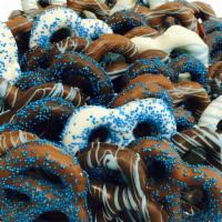 Chocolate Dipped Pretzels Gift Tray · Exclusively pretzels! A variety of three ring pretzels dipped in milk, dark and white chocol...