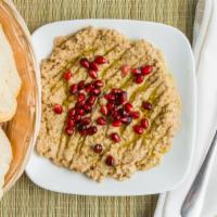 Baba Ghanoush · Vegan, gluten-free. Tahini and charred eggplant spread flavored with olive oil, garlic, pome...