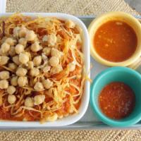 Koshary Bowl · Vegan. A hearty dish starring lentils, Egyptian rice, pasta, and a rich spicy tomato sauce a...
