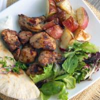Chicken Kabab Platter · Grilled chicken skewers marinated in yogurt, olive oil, sumac, and garlic, served with garli...