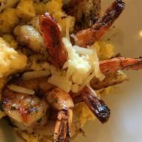 Shrimp & Polenta · Jumbo shrimp sauteed in garlic butter & fresh herbs; creamy polenta, pecorino cheese