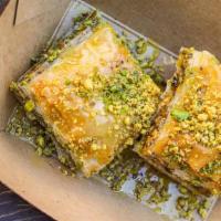 Baklava · Baklava is made by brushing the thin, papery sheets with butter and layering them with nuts,...