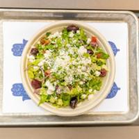 Greek Salad · Romaine lettuce, cucumber, tomato, onions, olives, feta and lemon vinaigrette.