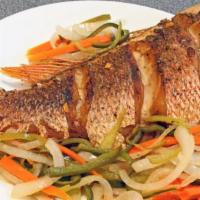 Escovitch Fish Meal · Fried Snapper fish. Seasoned with the best spices. Drenched with onions bell peppers, carrot...
