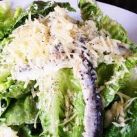 Caesar Salad · Romaine lettuce, creamy garlic- parmesan dressing, pizza crispell.