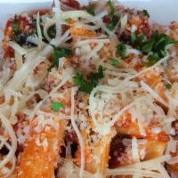 Spaghetti Bolognese · Spaghetti, housemade  marinara or Bolognese meat sauce, parmesan, fresh herbs.