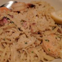 Shrimp Scampi · Linguini, garlic, herb butter, white wine, lemon, parmesan, fresh basil. 6 each large 13/15 ...