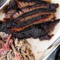 Two-Timer · Choose two Smoked meats, served with two Southern Sides. Add a Garden or Caesar Side Salad t...