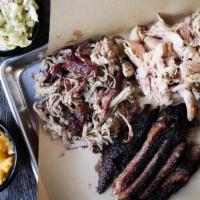 Tennessee Triple · Choose three smoked meats, served with two Southern Sides. Add a Garden or Caesar Side Salad...