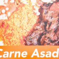 Carne Asada · Marinated and grilled thin beef steak. Served with two sides.