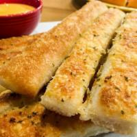Breadsticks · Delicious and warm breadsticks.