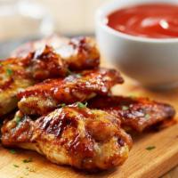 Honey Bbq Chicken Wings · Delicious breaded and fried wings tossed in sweet honey BBQ sauce.