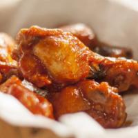Mambo Sauce Chicken Wings · Delicious breaded and fried wings tossed in house special mambo sauce.