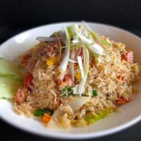 Saigon Fried Rice · Cured Pork | White Rice | Carrot | Egg | Ginger
Onion | Scallion | Tomato | Soy Sauce | Srir...