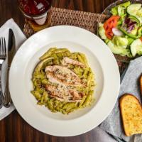 Pesto Pasta · Choice of spaghetti, fettuccine or penne pasta tossed in olive oil with diced tomato, garlic...