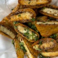 Paneer Pakora · Paneer ( Hard Cottage Cheese) Slices with a thin and crispy batter with a fiery mint chutney...