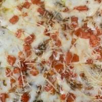 Margarita · Pesto With Our Signature Pizza Sauce, Baccio Mozzarella, Tomatoes